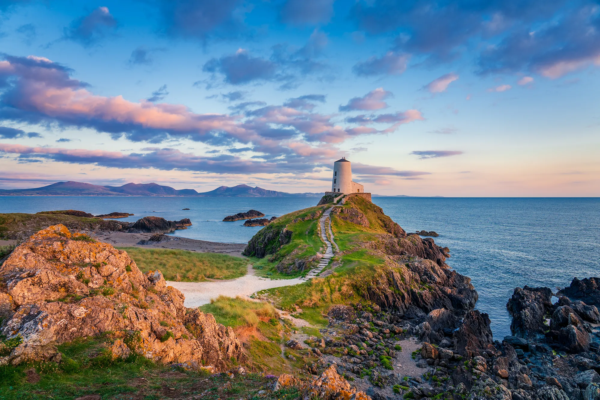 Ty Mawr Lighthouse at sunset on Llanddwyn Island in North Wales